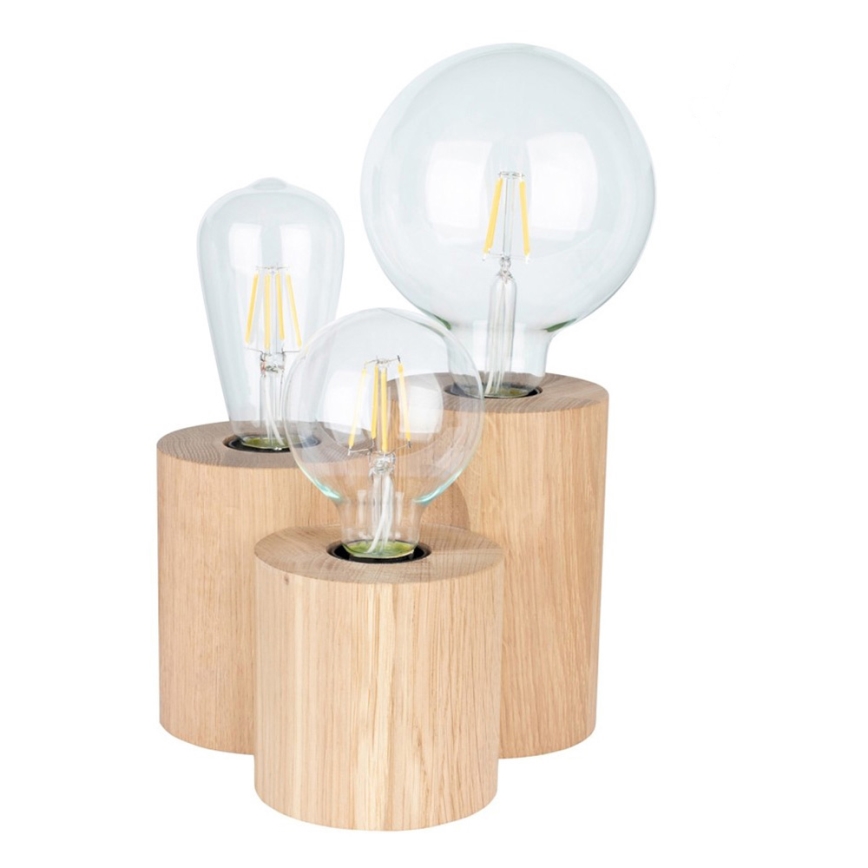 Tri LED žiarovky, rôznych veľkostí, sú umiestnené v drevených valcových podstavcoch. Podstavce sú z svetlého dreva a sú spojené do jednej kompozície.