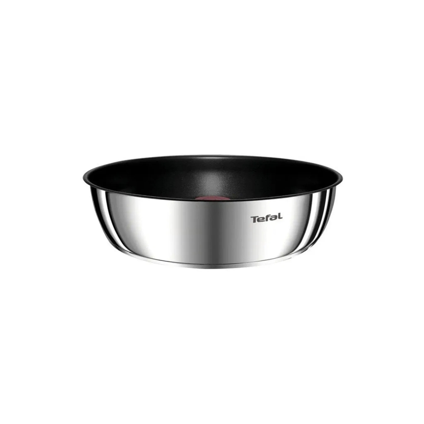 Nerezová panvica Tefal s nepriľnavým čiernym dnom stojí na bielom pozadí. Na bočnej strane je vyrazené logo Tefal.