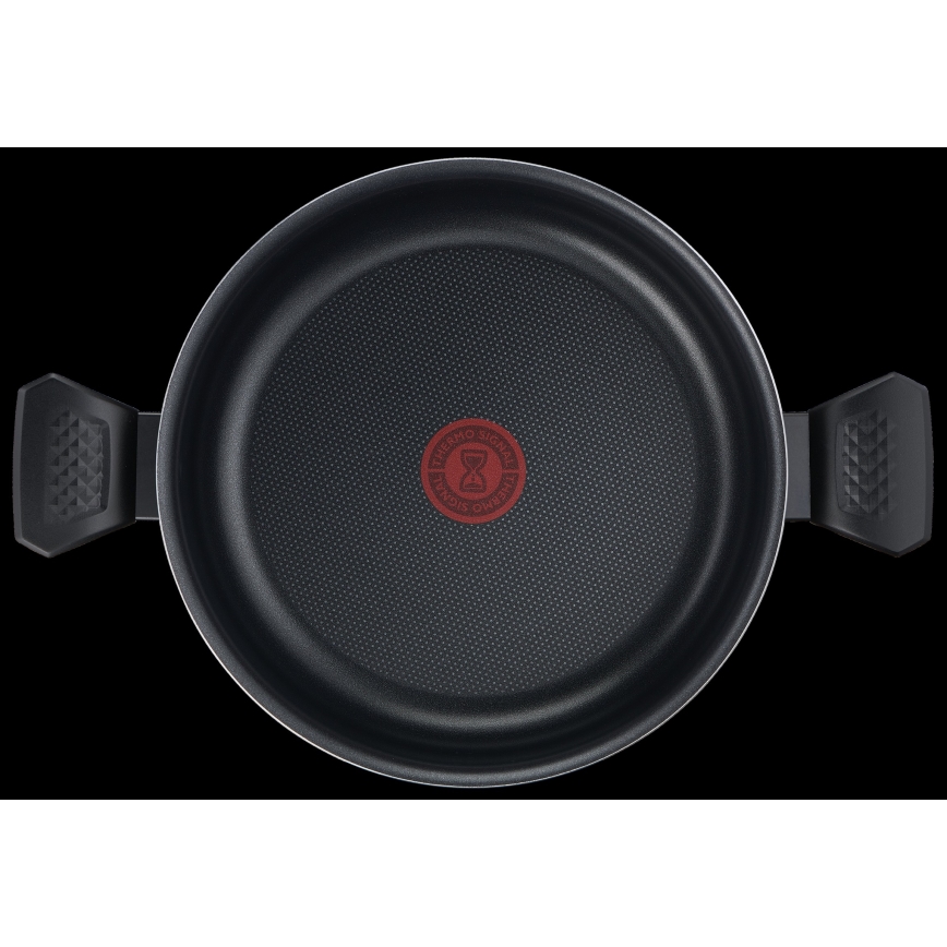 Hrnce s dvoma držadlami leží na čiernom pozadí. Jeho vnútorná časť je tmavosivá s jemnou bodkovanou štruktúrou a červeným logom THERMO SPOT v strede, ktorý obsahuje obrázok presýpacích hodín.