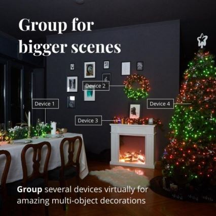 Vianočná scéna s vianočným stromčekom a krbom zdobenými svetielkami. Na stole je vianočná výzdoba. Text: „Group for bigger scenes“ a „Group several devices virtually for amazing multi-object decorations“. Zobrazené sú štyri zariadenia (Device 1-4).