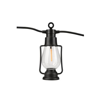 Čierna lampa tvaru petrolejky s priehľadným skleneným telom a LED žiarovkou je pripojená k čiernemu elektrickému káblu. Lampa je umiestnená na bielom pozadí.