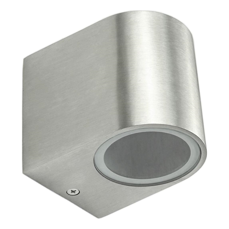 Nástenné svietidlo z nehrdzavejúcej ocele svieti. Má valcovitý tvar s okrúhlym difúzorom. Je pripevnené na stene.