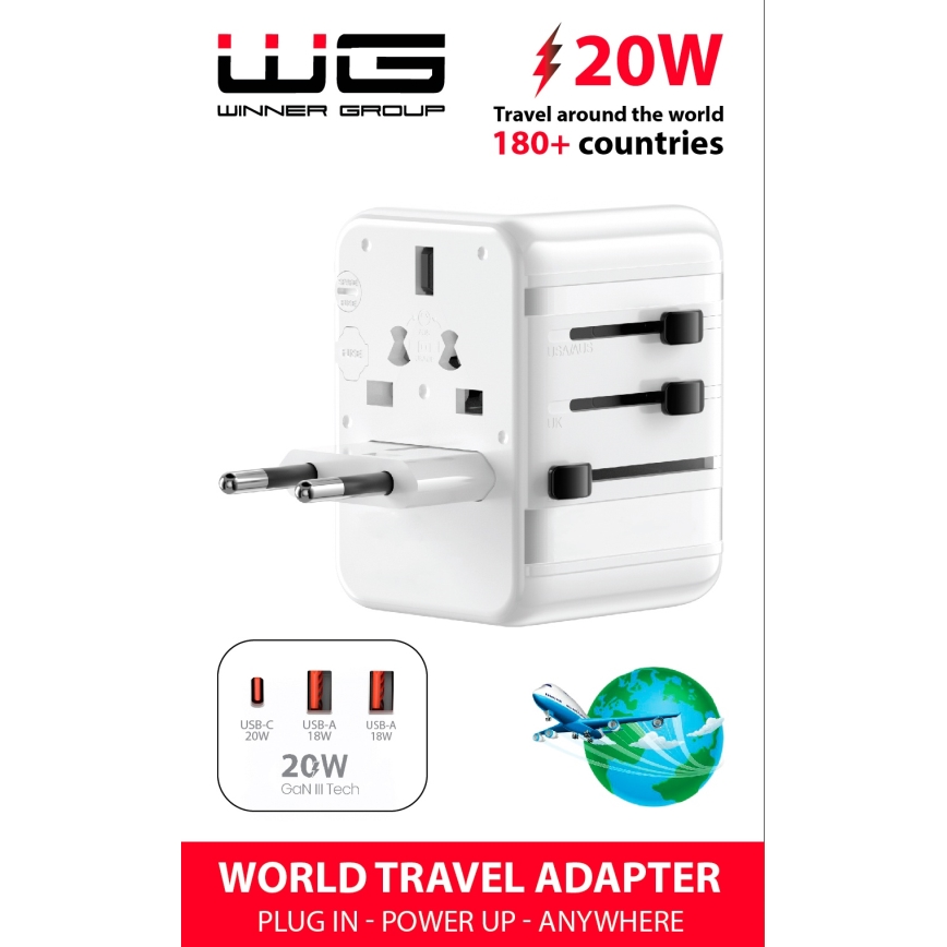 Biely cestovný adaptér s viacerými zásuvkami a USB portami umožňuje nabíjanie v 180+ krajinách. Má označenie 20W a logo Winner Group. Text hovorí: „WORLD TRAVEL ADAPTER PLUG IN - POWER UP - ANYWHERE“.