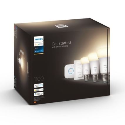 Balenie Philips Hue White Starter Kit obsahuje tri inteligentné žiarovky, ovládač a mostík. Balenie je tmavé, s obrázkami produktov a textom „Get started with smart lighting“. Na balení sú uvedené kompatibilné platformy: Amazon Alexa, Apple HomeKit a Google Assistant. Kód produktu je 1100 a 1055.